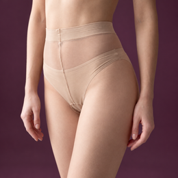 FRILLORA SW268 hosiery in a styled indoor setting