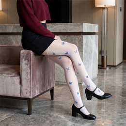 FRILLORA SW185 hosiery in a styled indoor setting