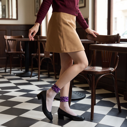 FRILLORA SW187 hosiery in a styled indoor setting
