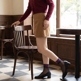 FRILLORA SW187 hosiery in a styled indoor setting